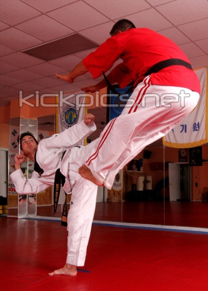 Kickpics Red KICKPICS - home of the hottest martial arts kicking photos on the planet.